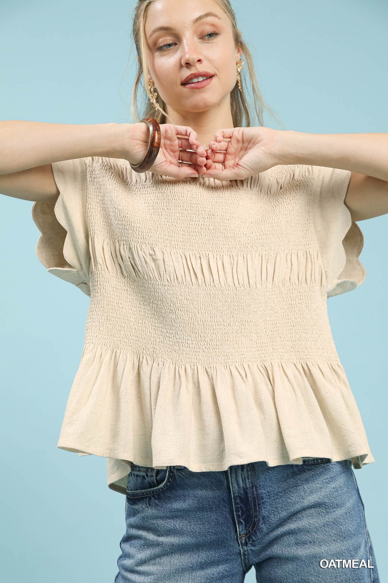Umgee Linen Blend Smocked Peplum Blouse